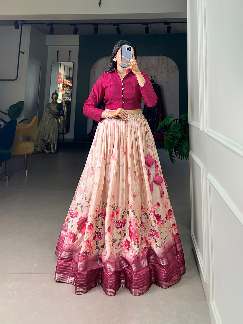 Embrace the allure of tradition with the modern charm of floral prints – the Dola Silk lehenga choli speaks volumes in elegance��.