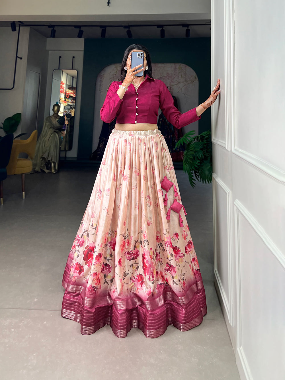 Embrace the allure of tradition with the modern charm of floral prints – the Dola Silk lehenga choli speaks volumes in elegance��.