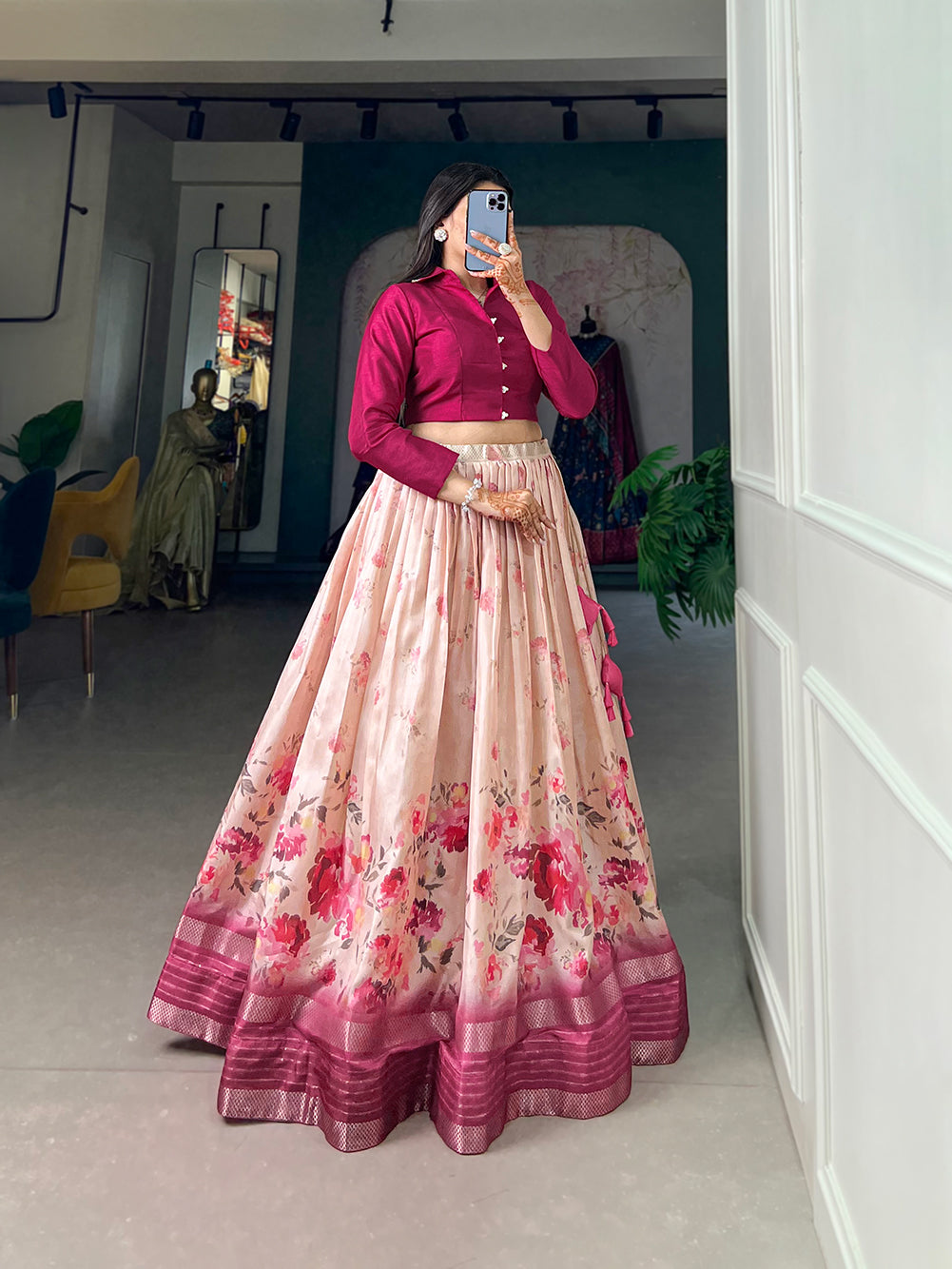 Embrace the allure of tradition with the modern charm of floral prints – the Dola Silk lehenga choli speaks volumes in elegance��.