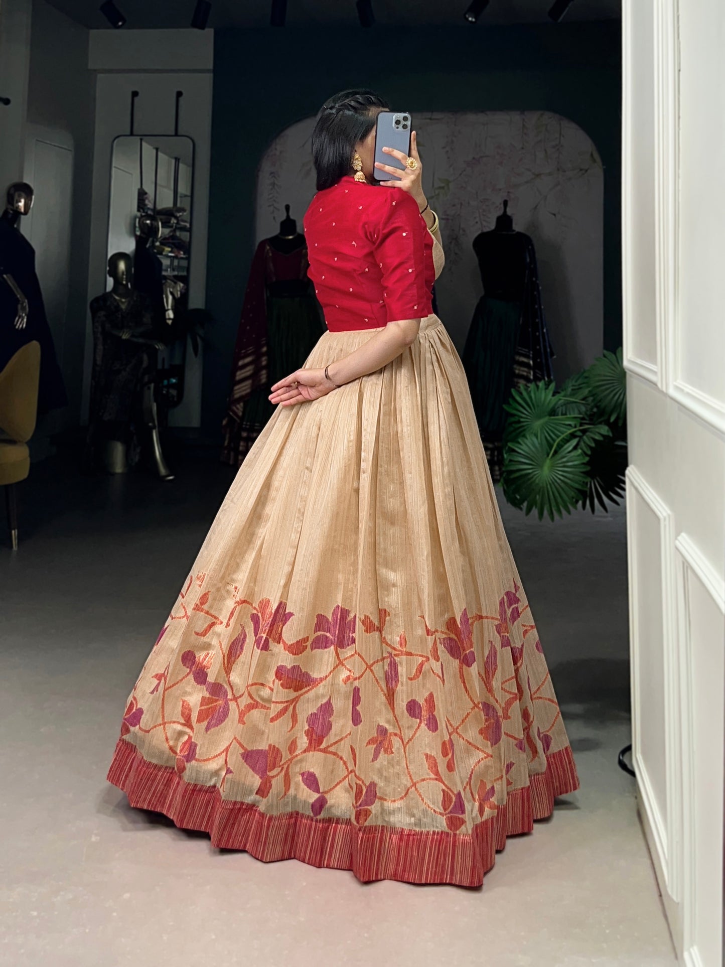 "Own the spotlight in this stunning silk gown paired with a statement Banglori jacket