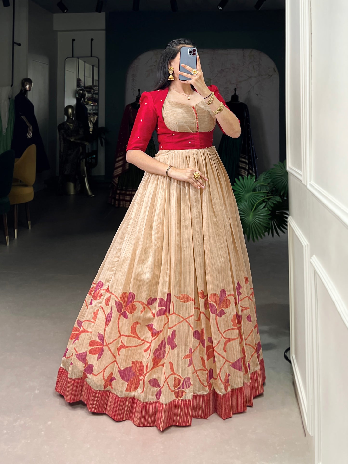 "Own the spotlight in this stunning silk gown paired with a statement Banglori jacket