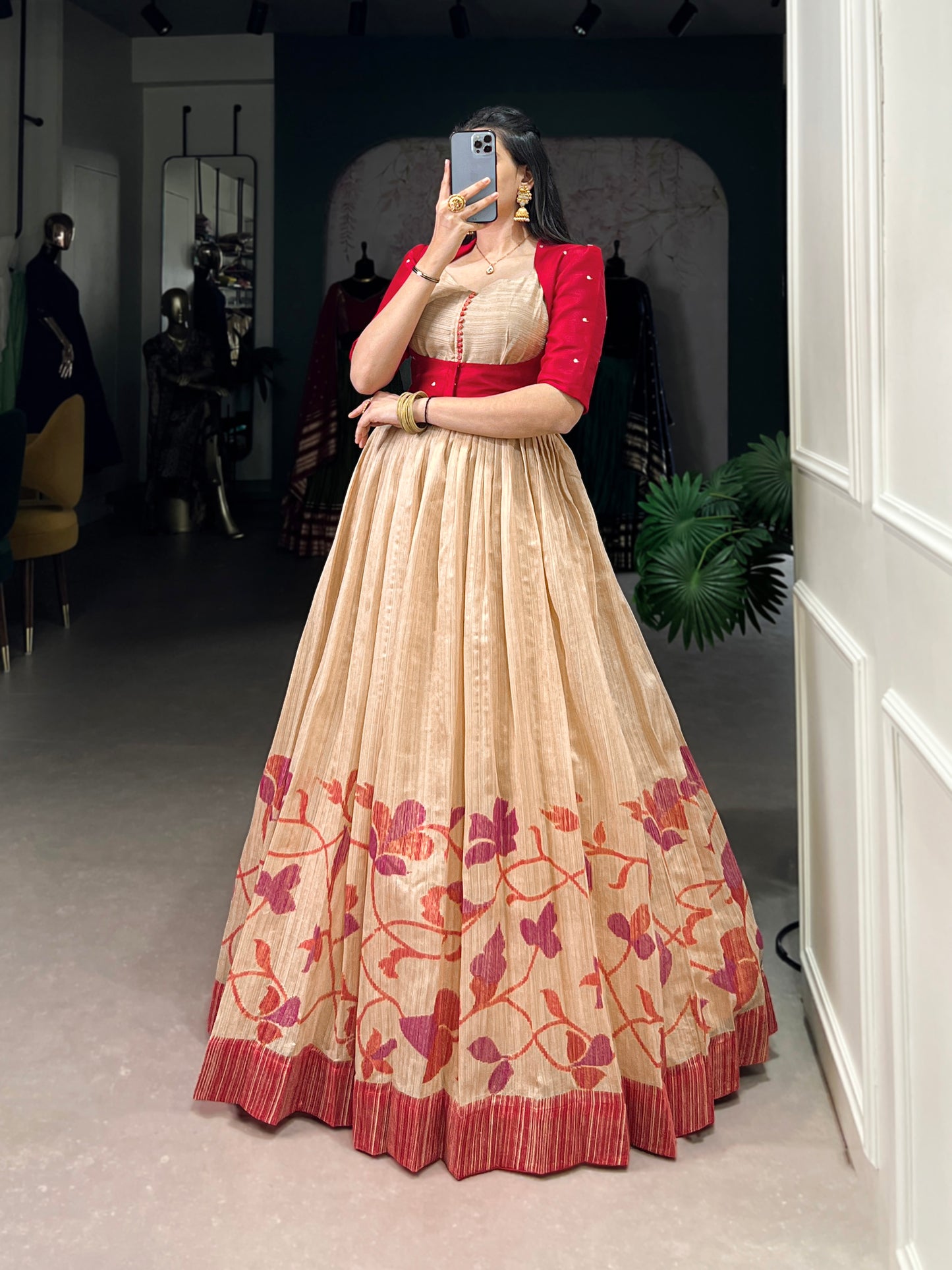 "Own the spotlight in this stunning silk gown paired with a statement Banglori jacket