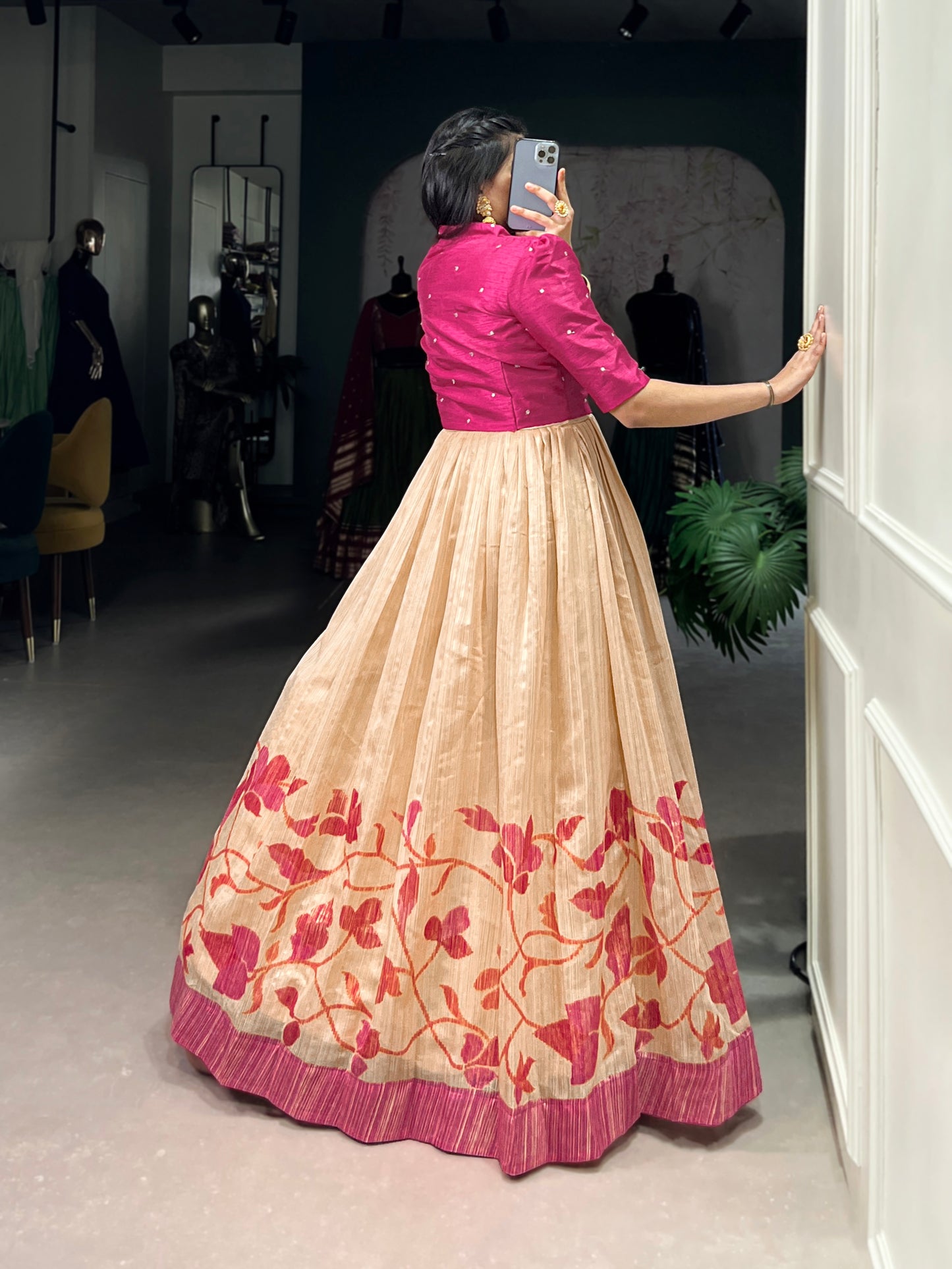 "Own the spotlight in this stunning silk gown paired with a statement Banglori jacket