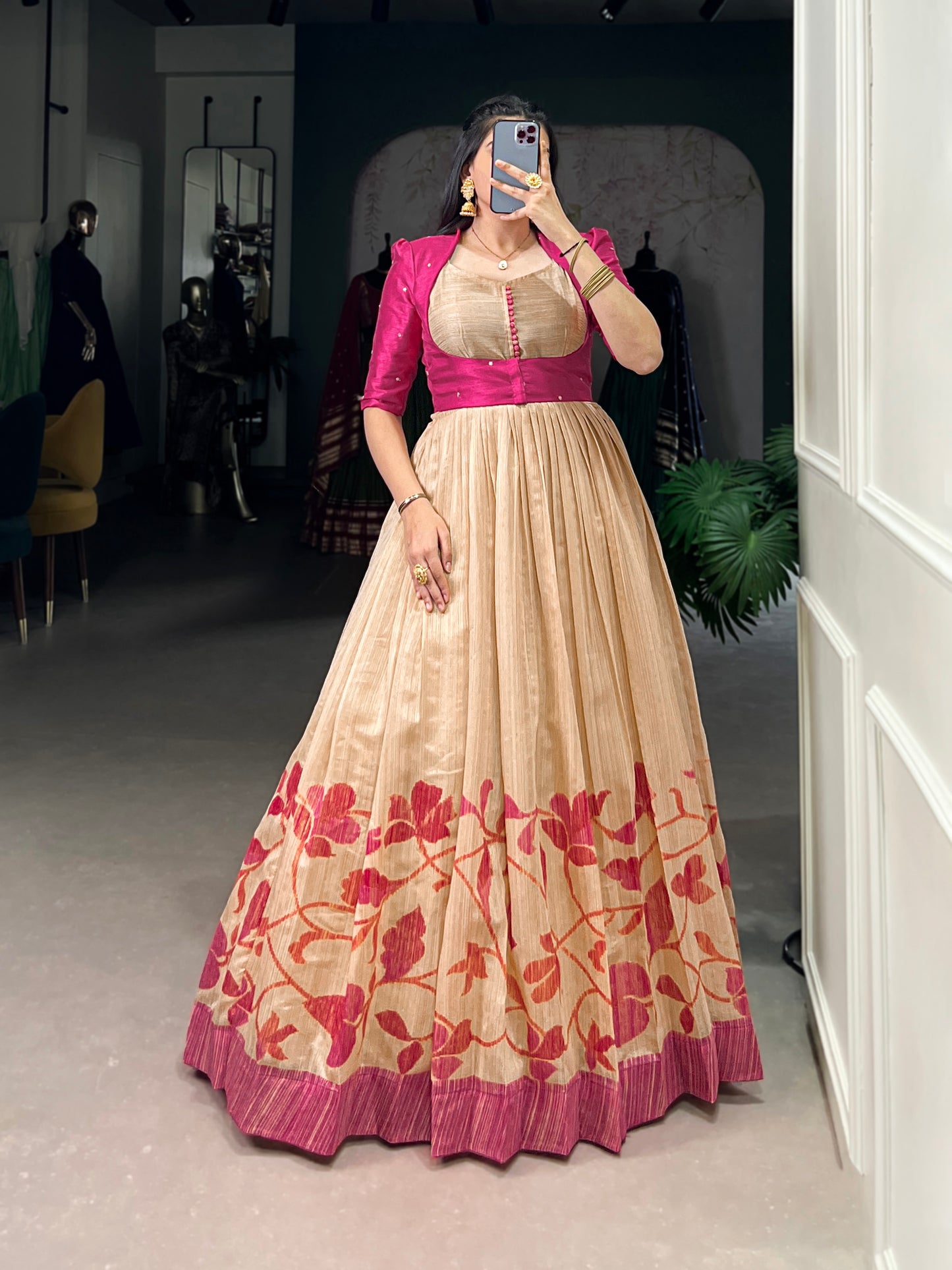 "Own the spotlight in this stunning silk gown paired with a statement Banglori jacket