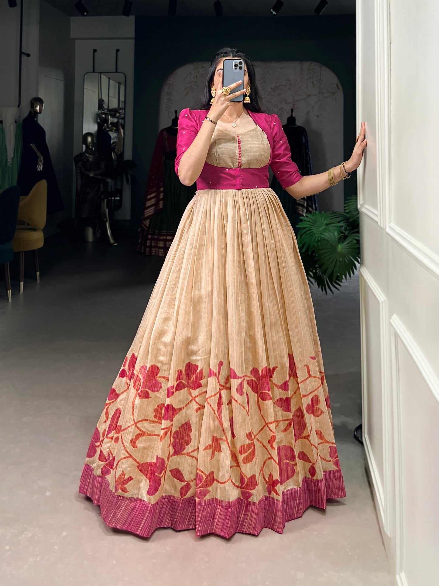 "Own the spotlight in this stunning silk gown paired with a statement Banglori jacket