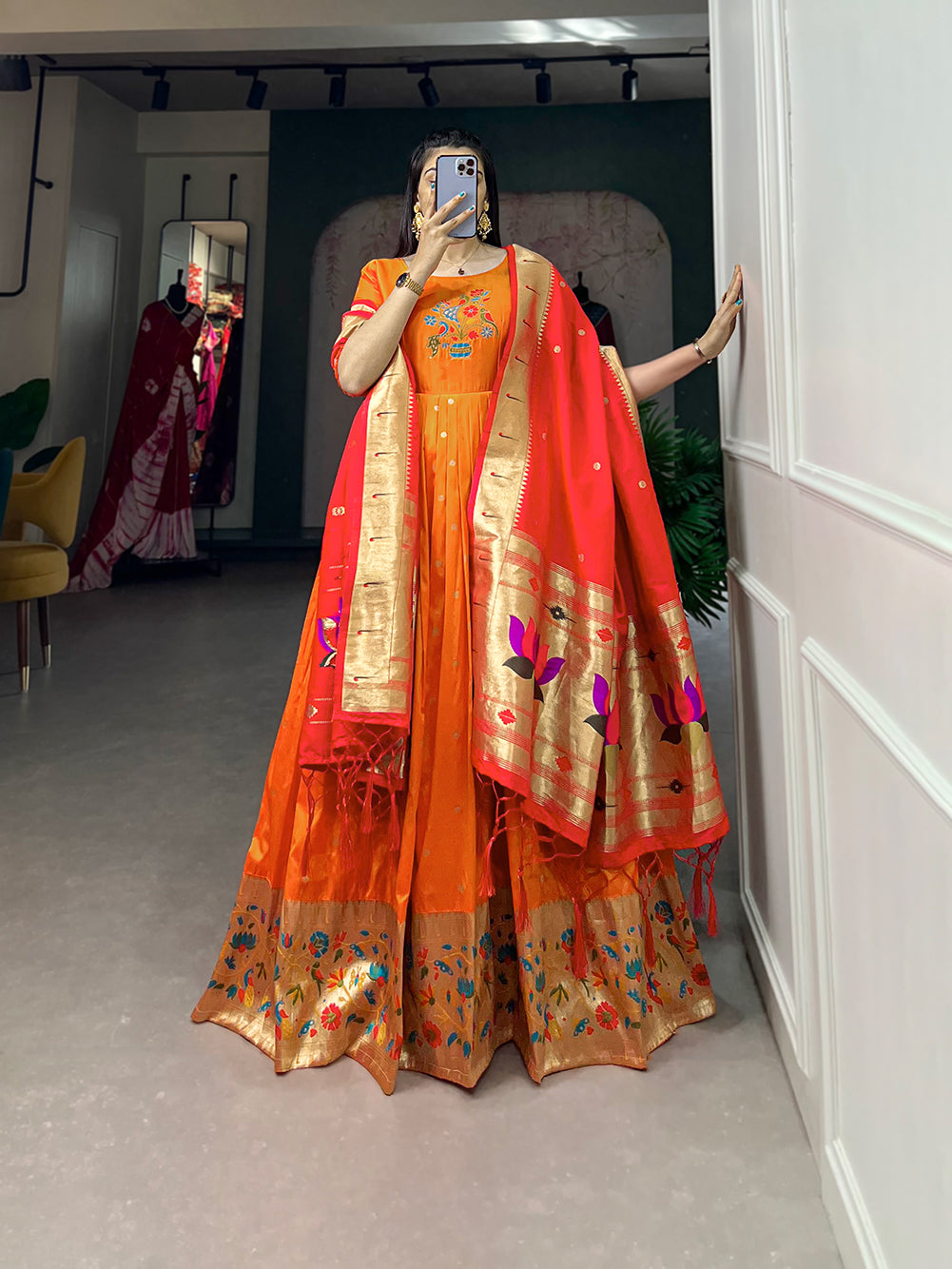 Woven with threads of tradition and dreams, the Jacquard silk Paithani dress embodies timeless elegance