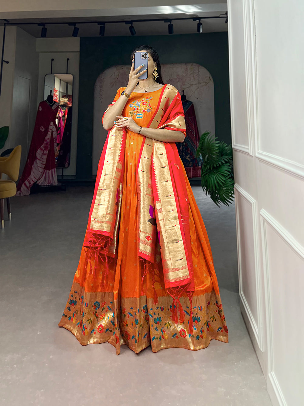 Woven with threads of tradition and dreams, the Jacquard silk Paithani dress embodies timeless elegance