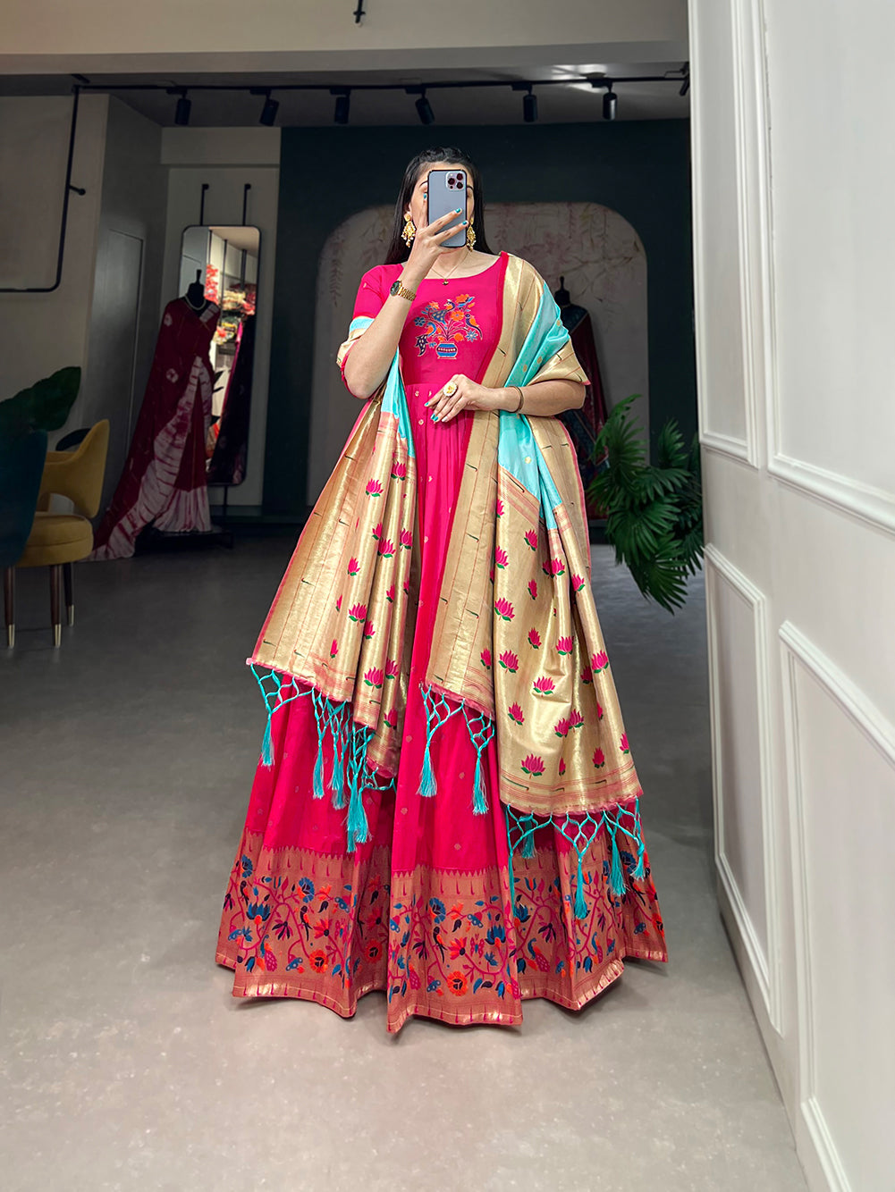 Woven with threads of tradition and dreams, the Jacquard silk Paithani dress embodies timeless elegance
