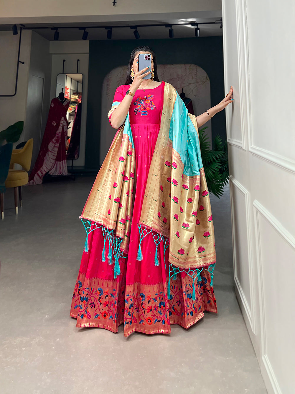 Woven with threads of tradition and dreams, the Jacquard silk Paithani dress embodies timeless elegance