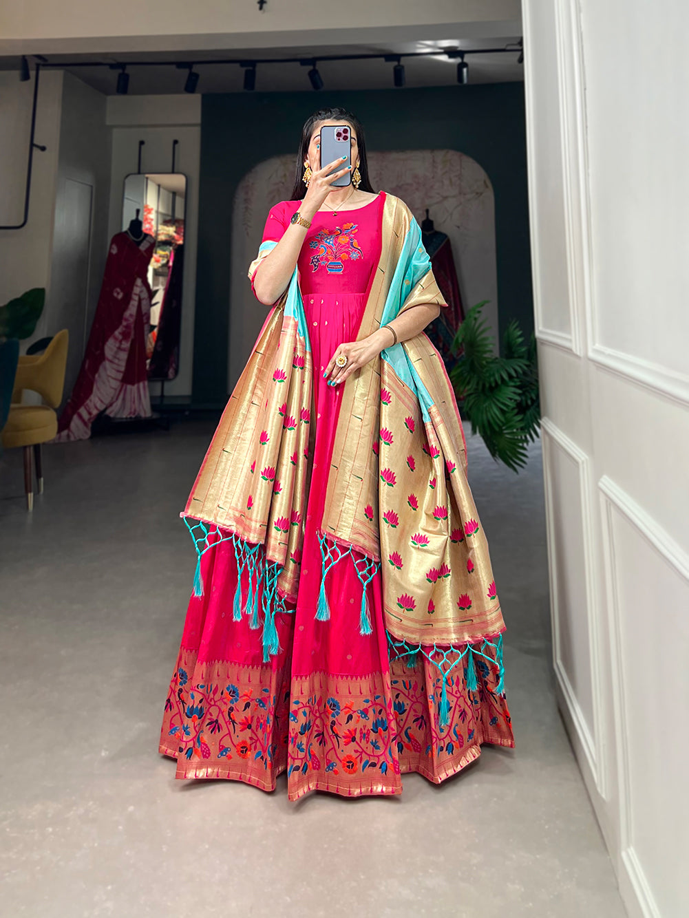 Woven with threads of tradition and dreams, the Jacquard silk Paithani dress embodies timeless elegance