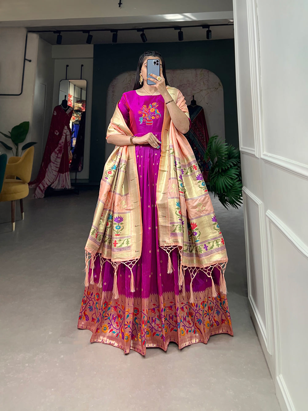 Woven with threads of tradition and dreams, the Jacquard silk Paithani dress embodies timeless elegance