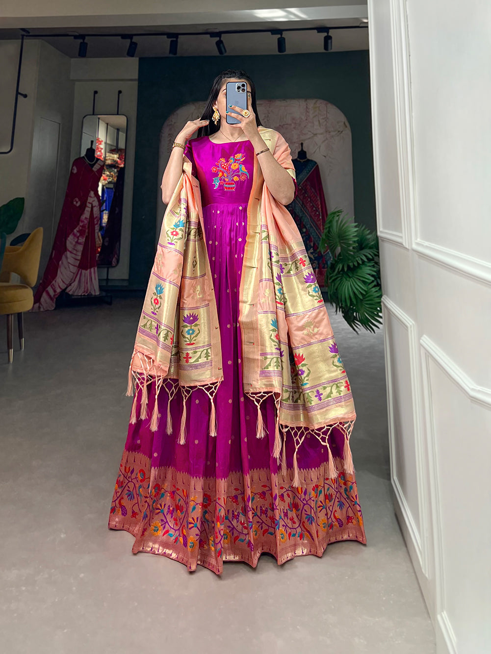 Woven with threads of tradition and dreams, the Jacquard silk Paithani dress embodies timeless elegance
