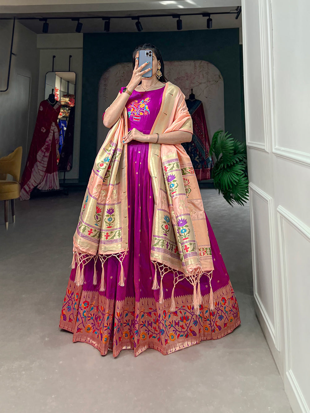 Woven with threads of tradition and dreams, the Jacquard silk Paithani dress embodies timeless elegance